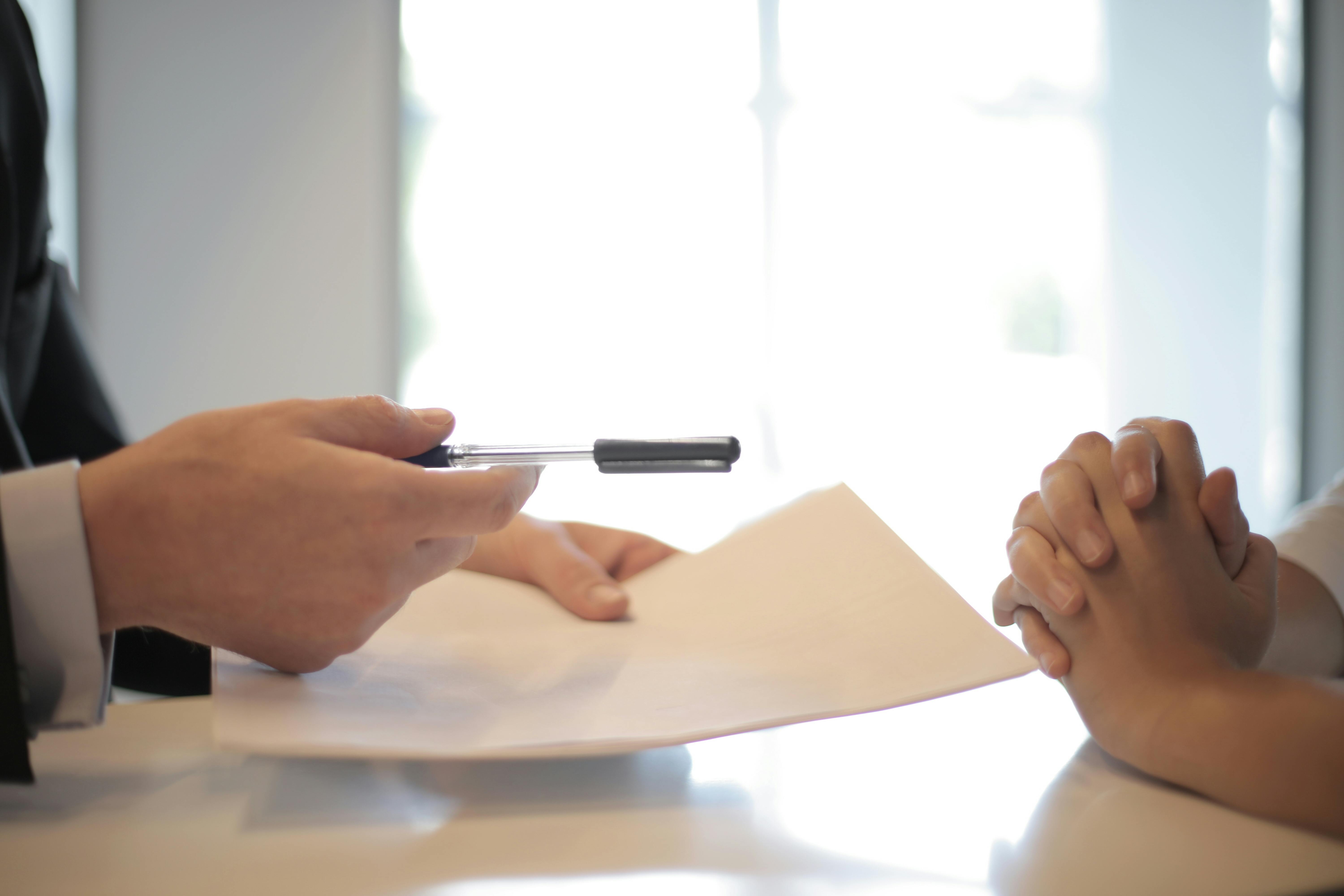 Person signing official citizenship documents