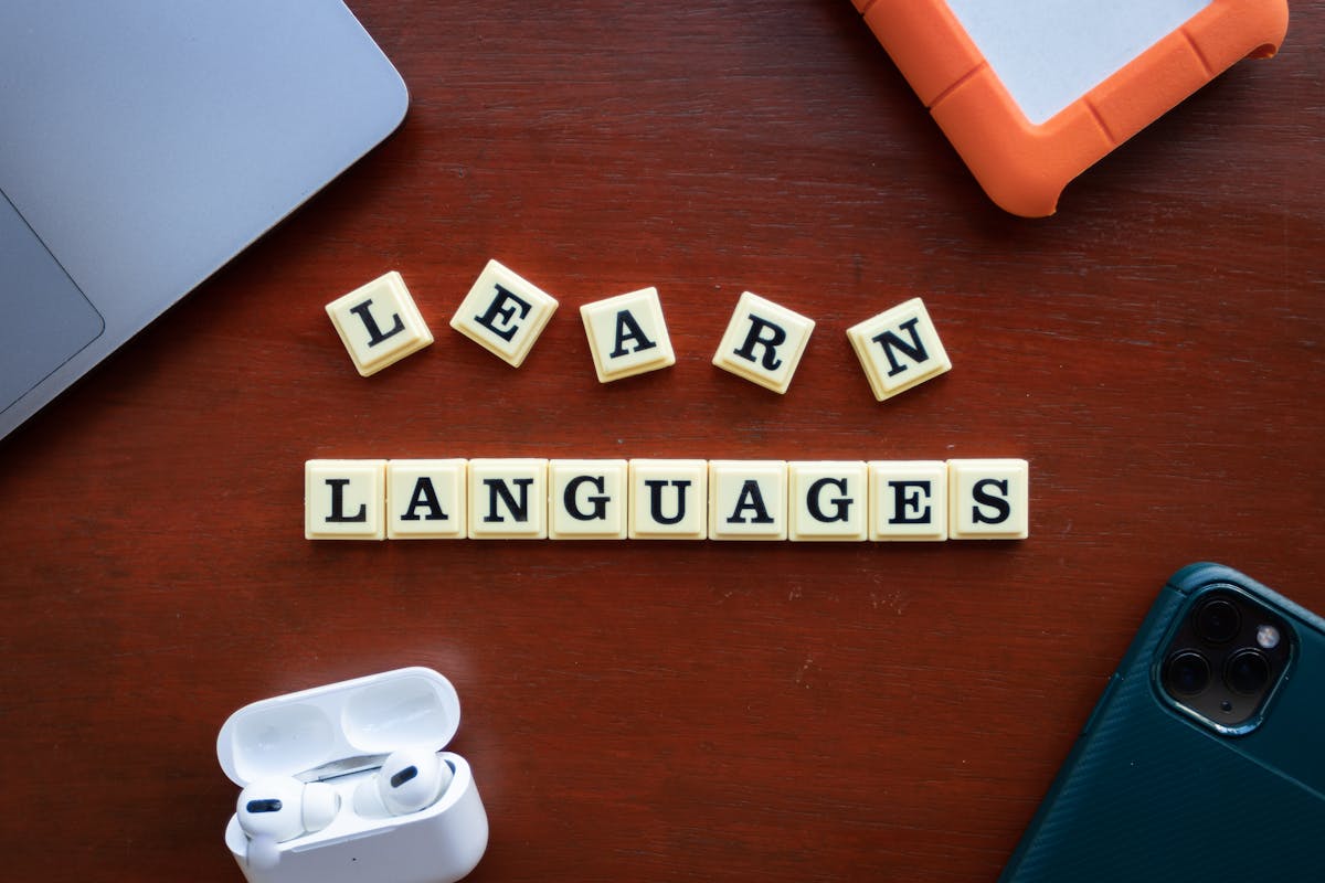 Scrabble tiles spelling Learn Languages on a desk