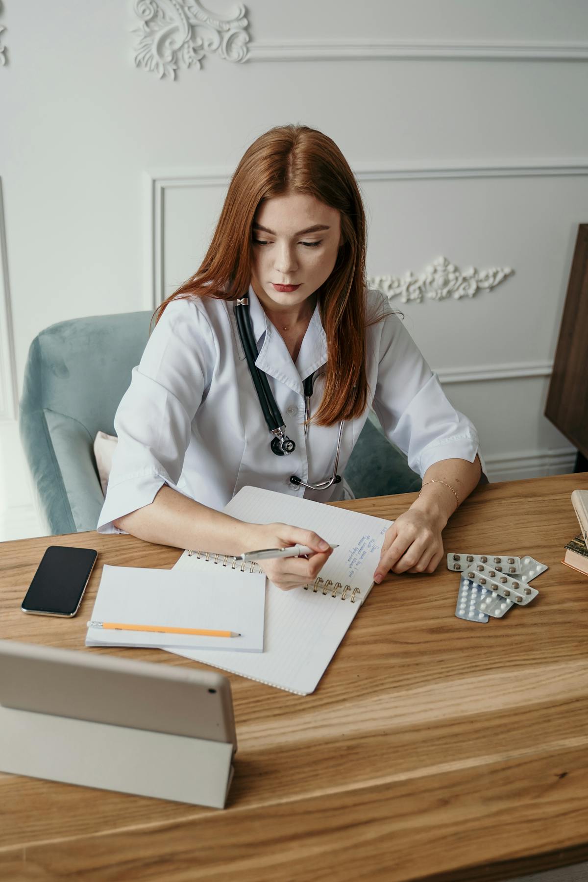 Doctor writing a sick note Krankschreibung in Germany